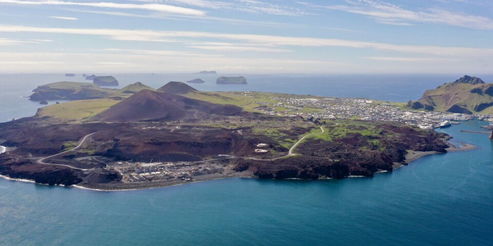 A view of Laxey's construction site at Viðlagafjara (foreground) on the island of Vestmannaeyjar before the first eight grow-out tanks were completed. The island's harbour area is to the right.