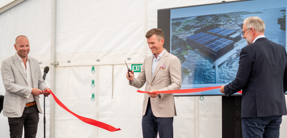 Knut Nikolai Ugland, majority owner of Baring Group, cuts a ribbon to officially open the Baring Farsund RAS.