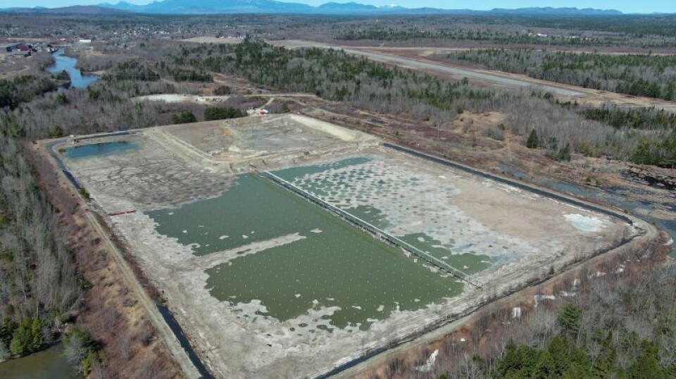 A drone photo of Great Northern Salmon's 27-acre site, taken last month. The fish farm will be built on the reinforced bed of a drained lagoon associated with a former paper mill. Inset: Kevin Kelsey.