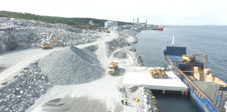 A bulk carrier next to the jetty which was completed in April. The industrial site in the background hosts a methanol plant operated by state-owned Equinor and a Linde Air gases/ oxygen plant.